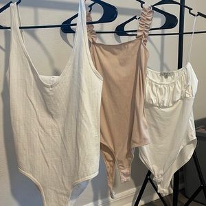 Three body suits size medium